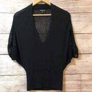 Bebe V-Neck Top with Open Fabrication Knit Back